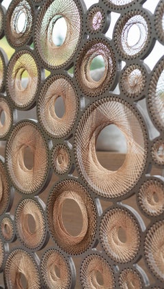 Les cercles du temps de Piegatto, une sculpture textile contemporaine