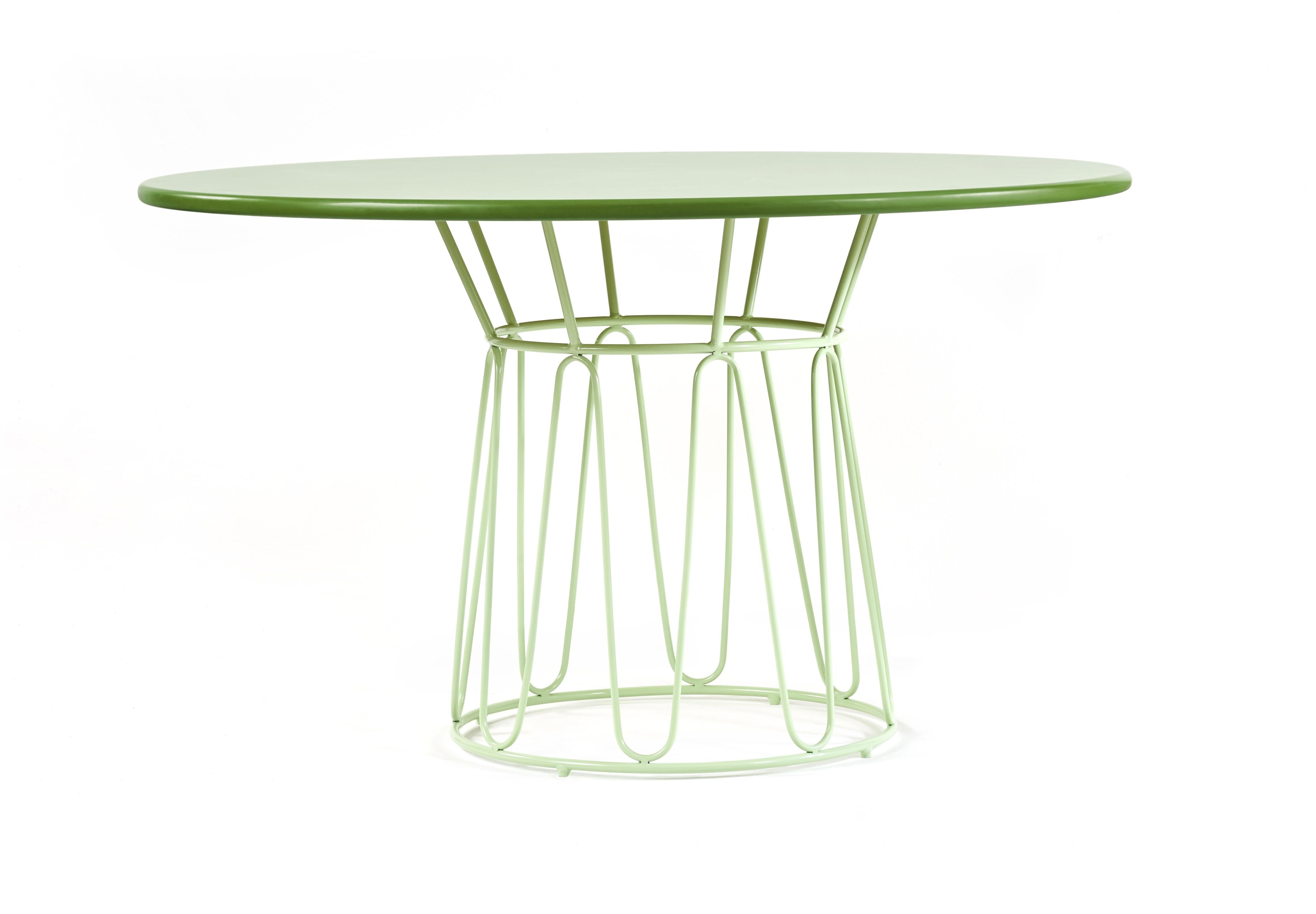 Circo dining table by Sebastian Herkner
Materials: Galvanized and powder-coated tubular steel. Aluminum top. 
Technique: Weaved by local craftspeople in Colombia. 
Dimensions: 
Top Diameter 135 cm 
Base Diameter 59 x H 77.5 cm
Available in