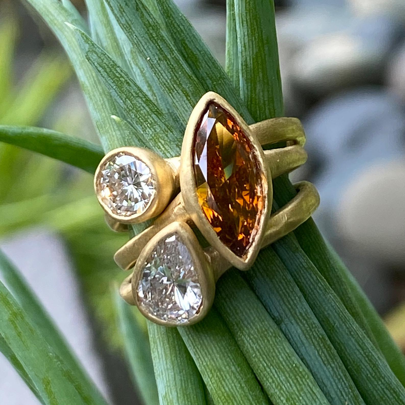 Versatile and fun to wear, individually or stacked together, this vivid set of earth-mined diamond solitaires by Eytan Brandes features three very different stones.  

The big marquise is set at a jaunty angle; it has a classic marquise cut but