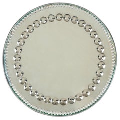 Circular 1900's sorcerers mirror / tray stamped Made in England to back