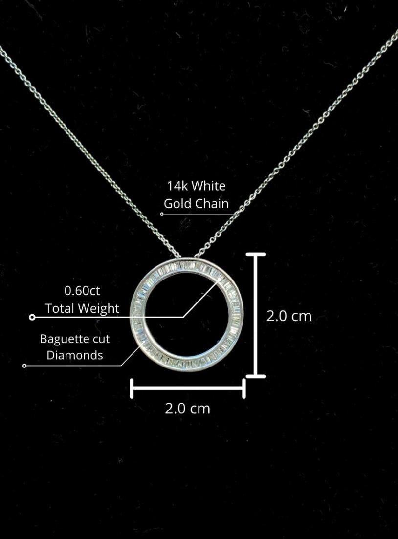Circular shape pendant with VS2 natural baguette cut diamonds mounted in 14k solid white gold. Pendant links with chain at any point in the setting for extra utility and movement. (for those who fidget with their pendants like I do!). 

I really