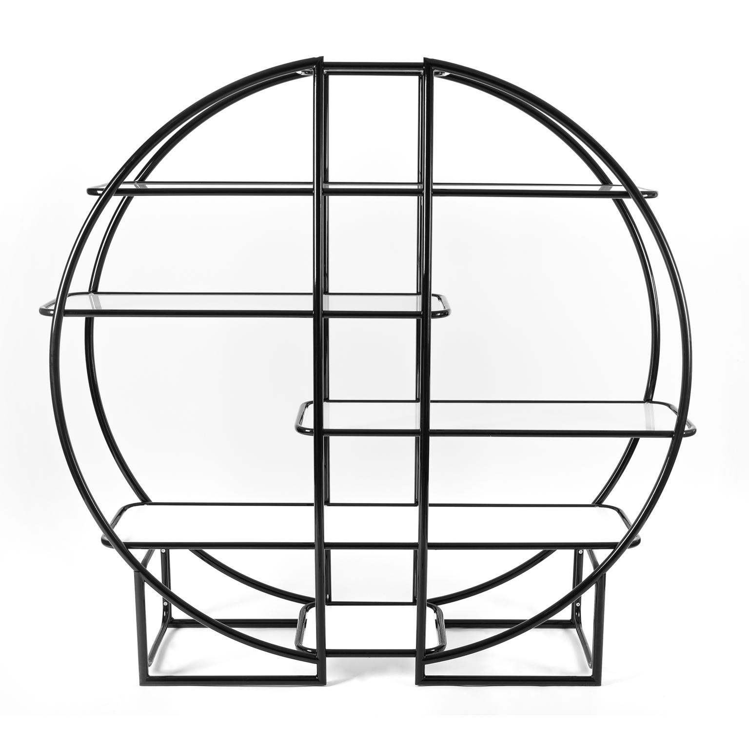 Amazing round étagère or vitrine or book case in the manner of Milo Baughman with six various sized glass shelves. This piece can be put against the wall but is also great to use as room divider. 

Great piece and a case example of Bauhaus, Art Deco