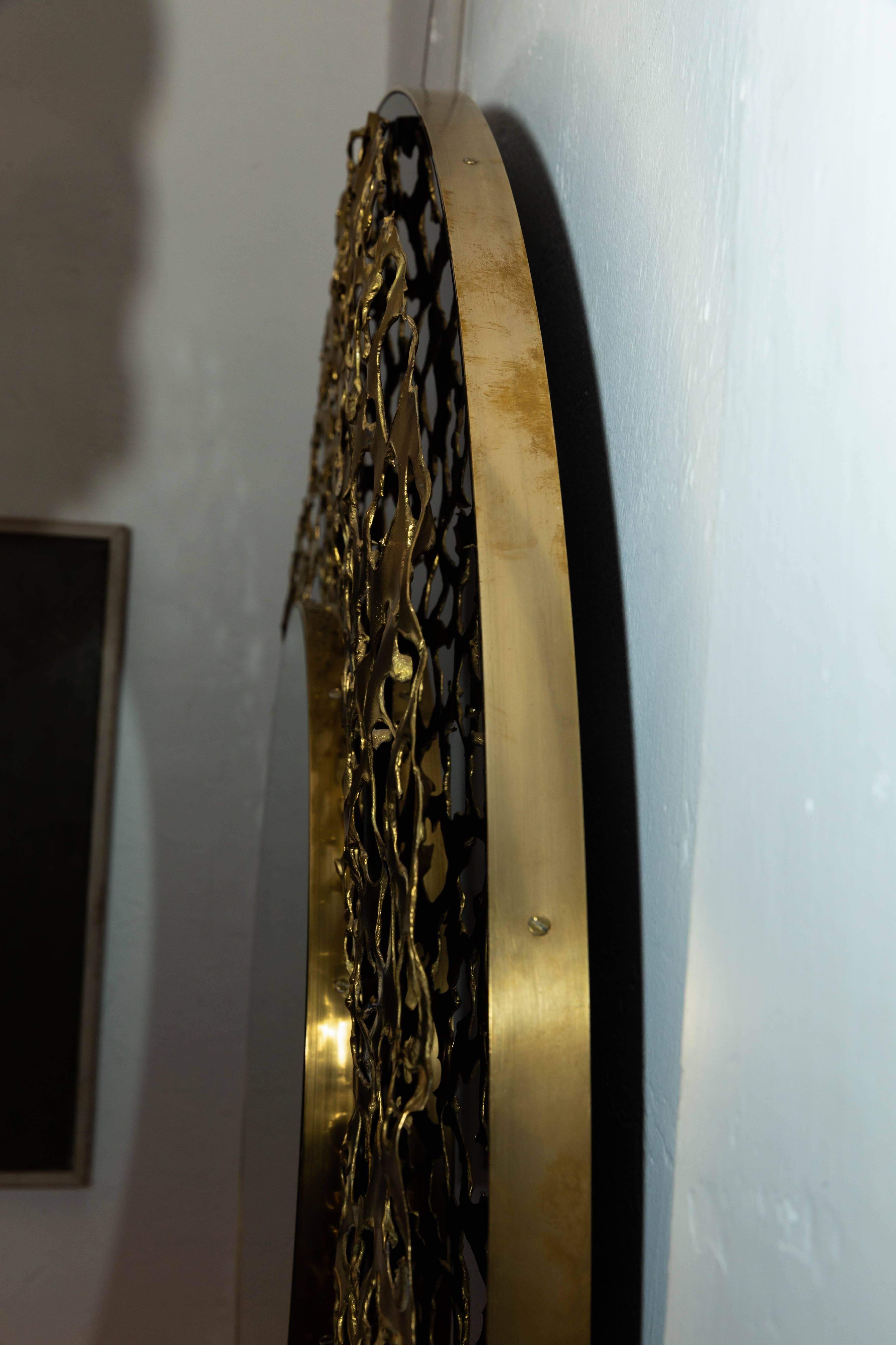 20th Century Circular Black Mirror with Brass Brutalist Design
