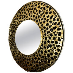 Circular Black Mirror with Brass Brutalist Design