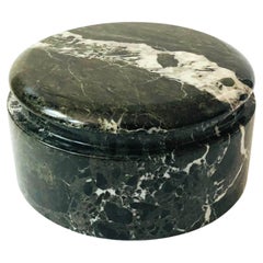 Caja circular de piedra negra