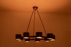 Circular chandelier in matte golden brass. Contemporary Italian work.