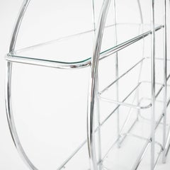 Circular Chrome Etagere with Glass Display Shelves