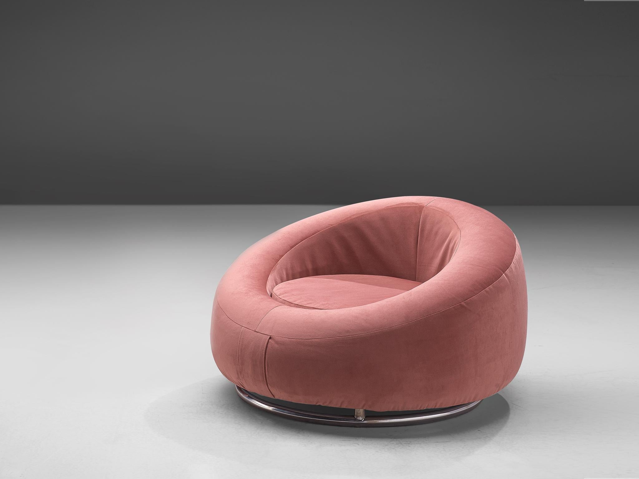 Club chairs, pink velvet and chromed metal, Italy, 1970s.

This lounge chair is a must if you are looking for some Hollywood Regency pieces for your interior. The low seat features a circular shape with a thick shell around that functions as