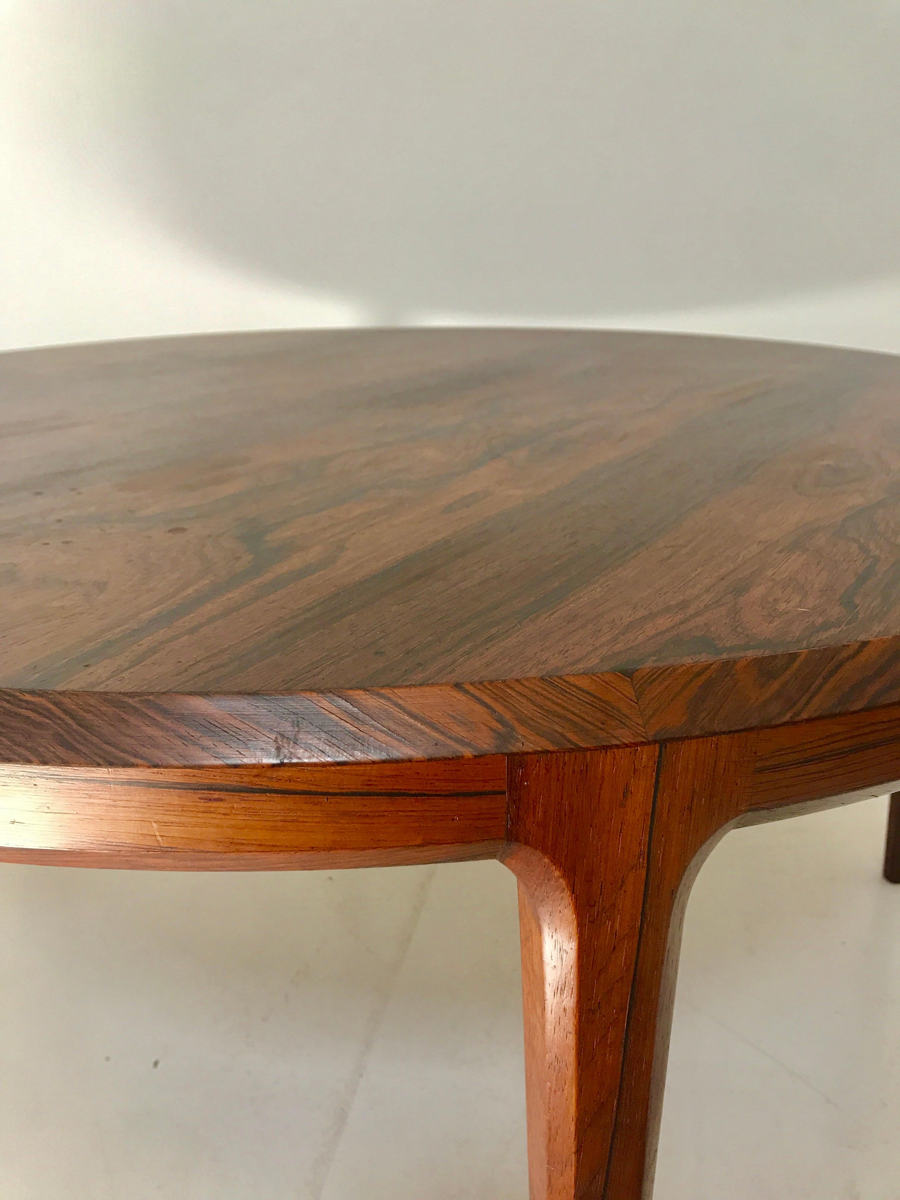 Beautiful rosewood coffee table was design by Johannes Anderson for C.F.C Silkeborg and manufactured in Denmark during the 1960s. It is a model number 283. This series of tables was one of Andersen's most popular. The unique constraction technique