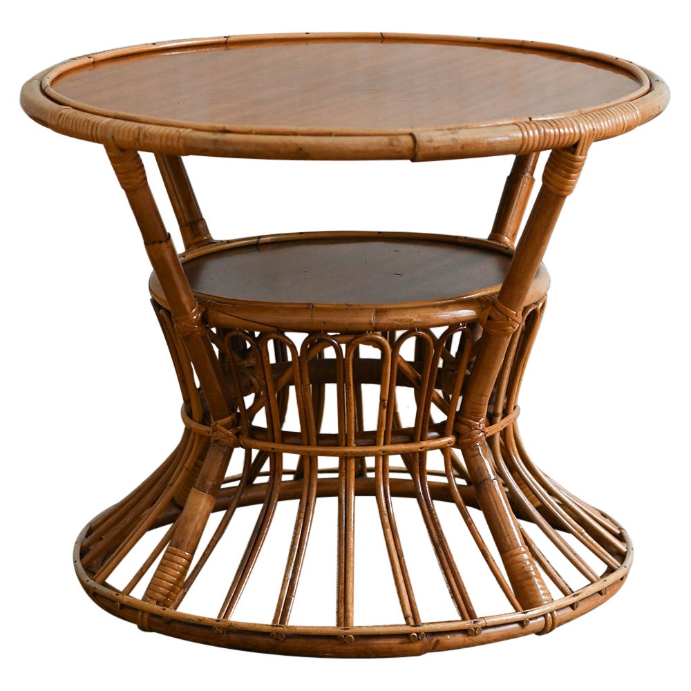 Circular coffee table with rattan motifs and wooden shelves, 1960s
