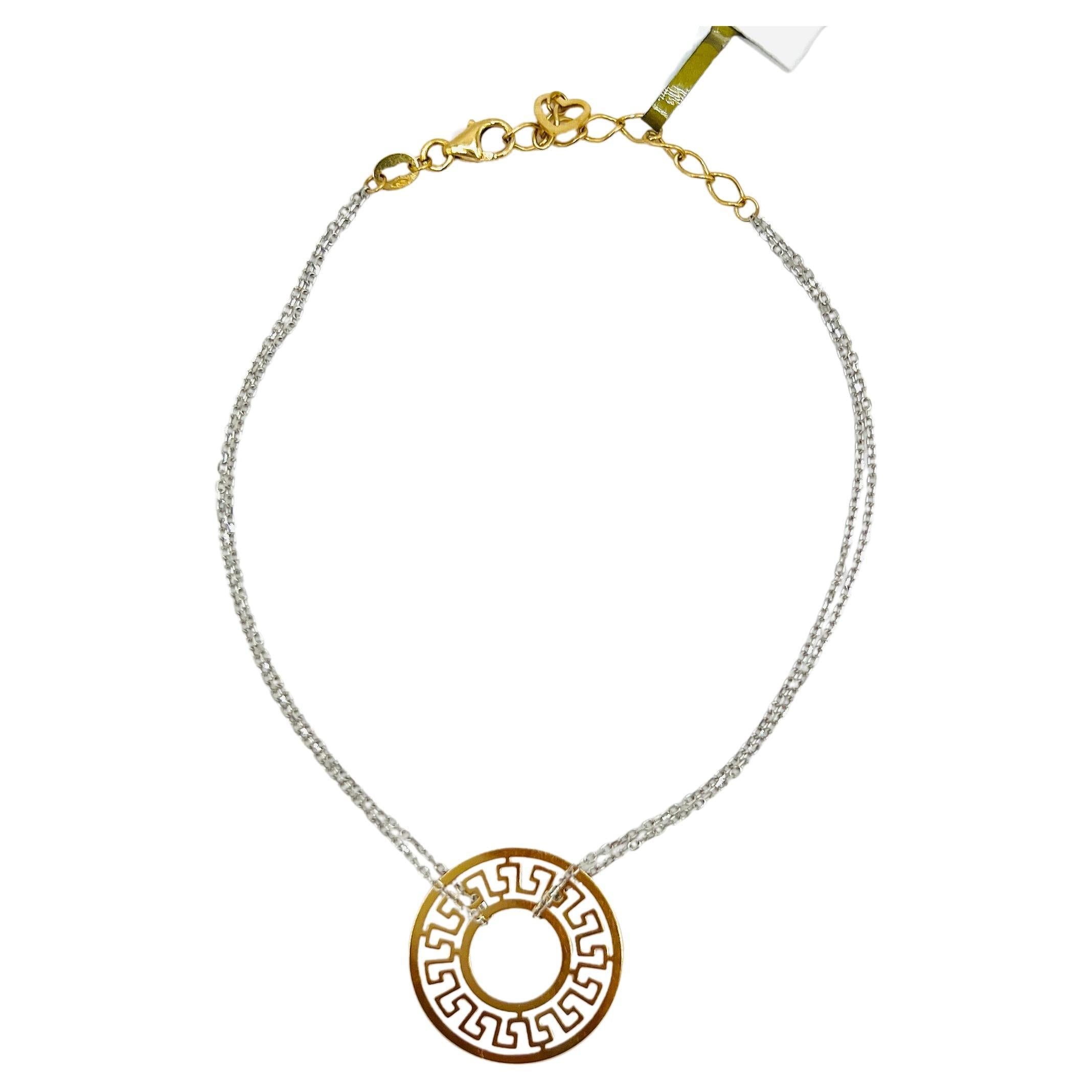 Circular Cut Out Charm Bracelet in 18K 2 Tone Gold For Sale