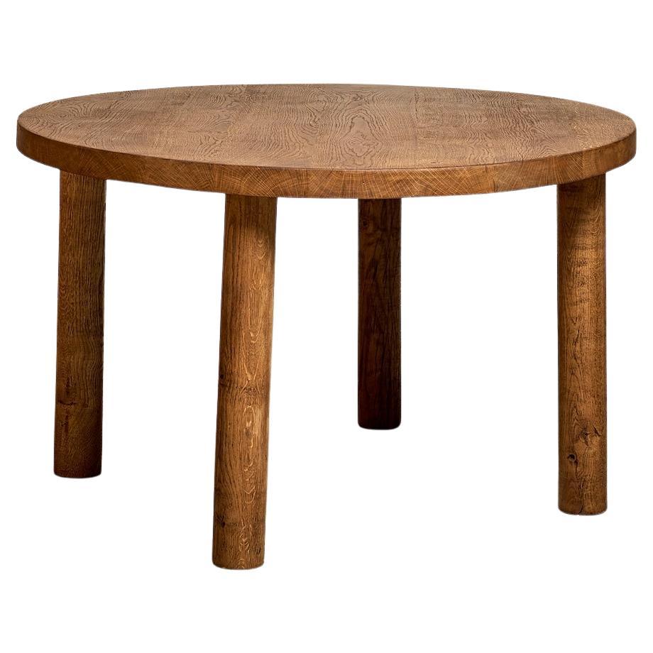 Circular dining table in solid oak, France circa 1950