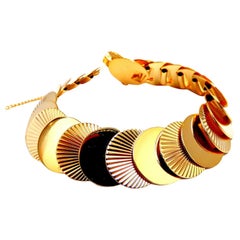 Bracelet circulaire à maillons en forme de disque et de rayon en or 14 carats