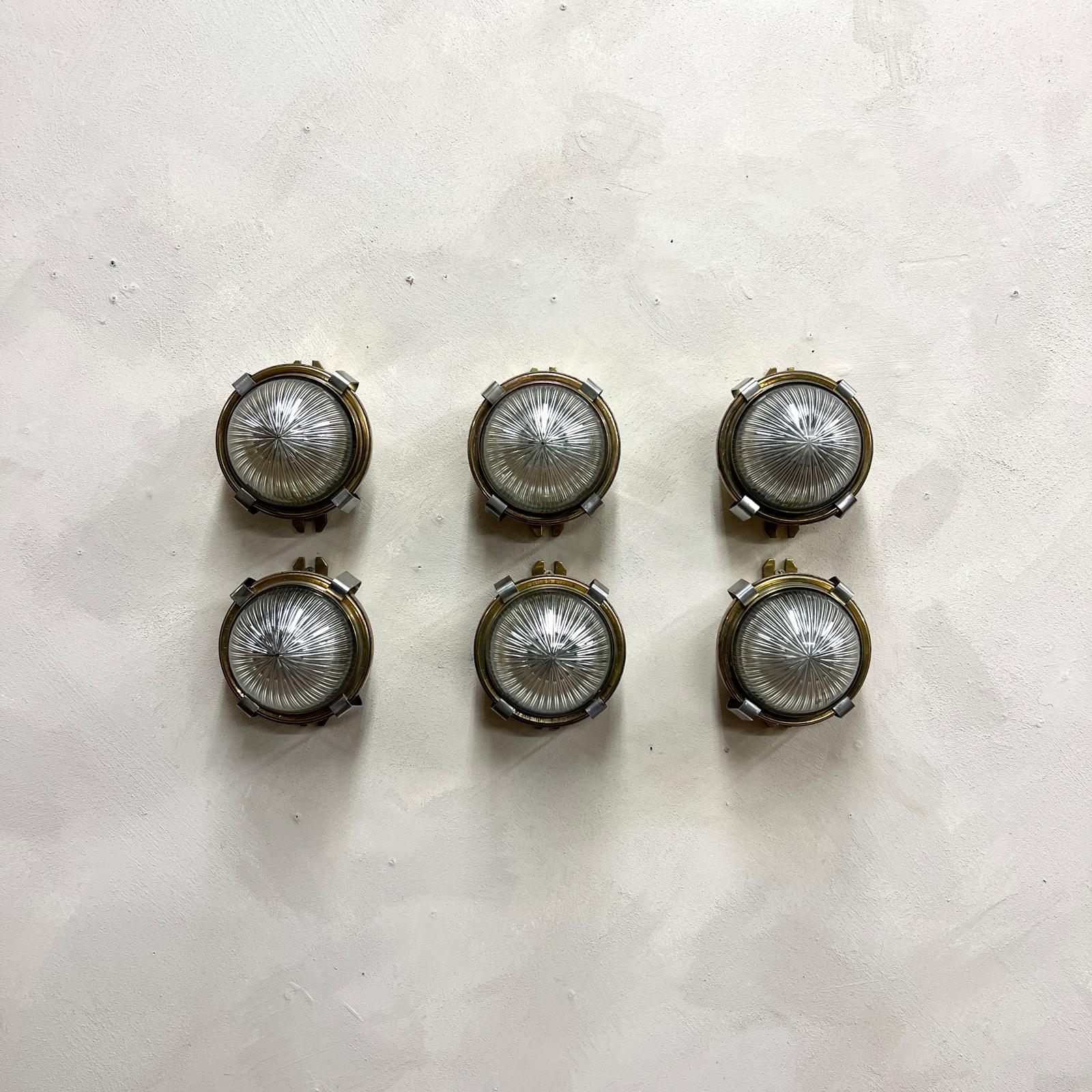 Circular Domed Holophane and Pressed Brass Wall lights 1