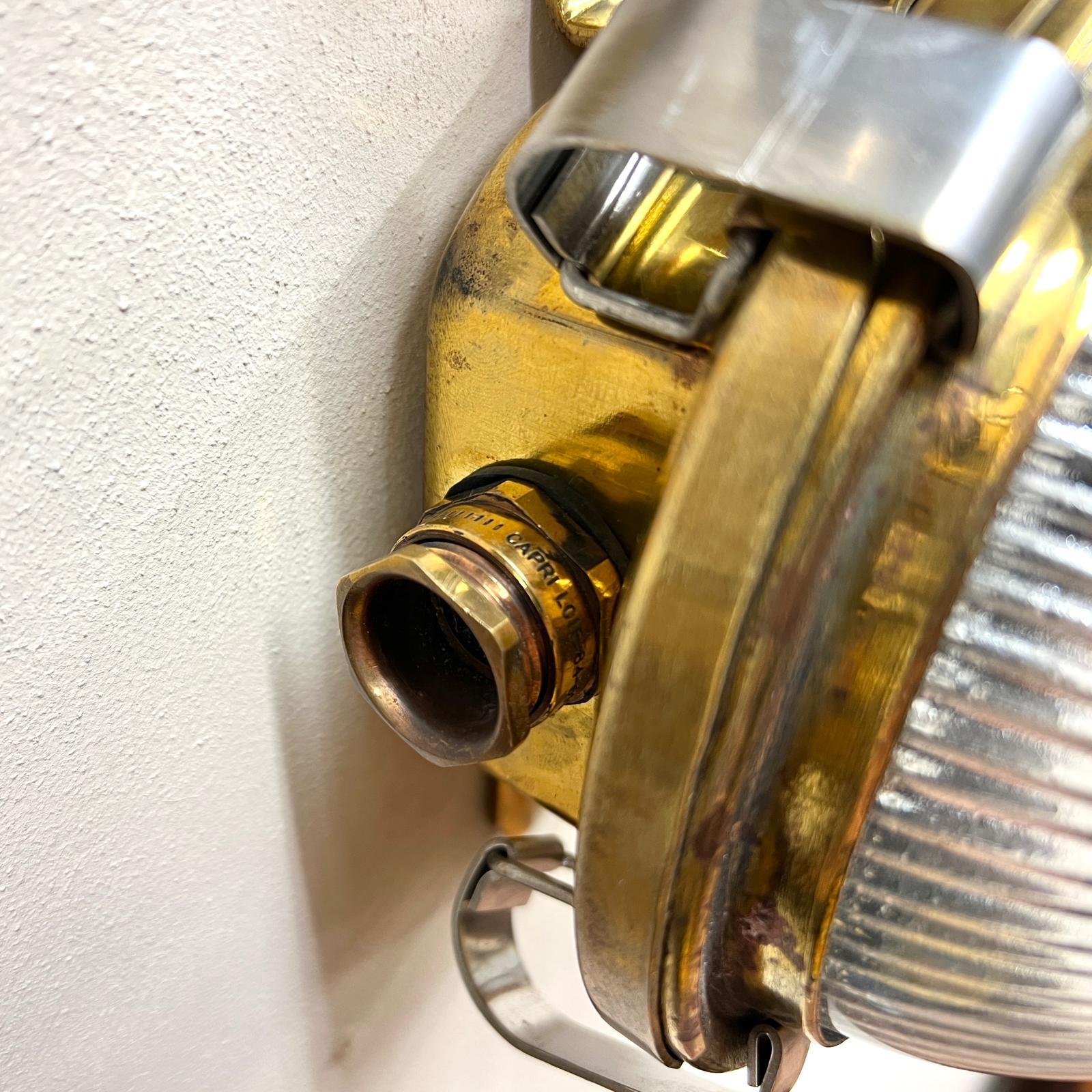 Circular Domed Holophane and Pressed Brass Wall lights 2
