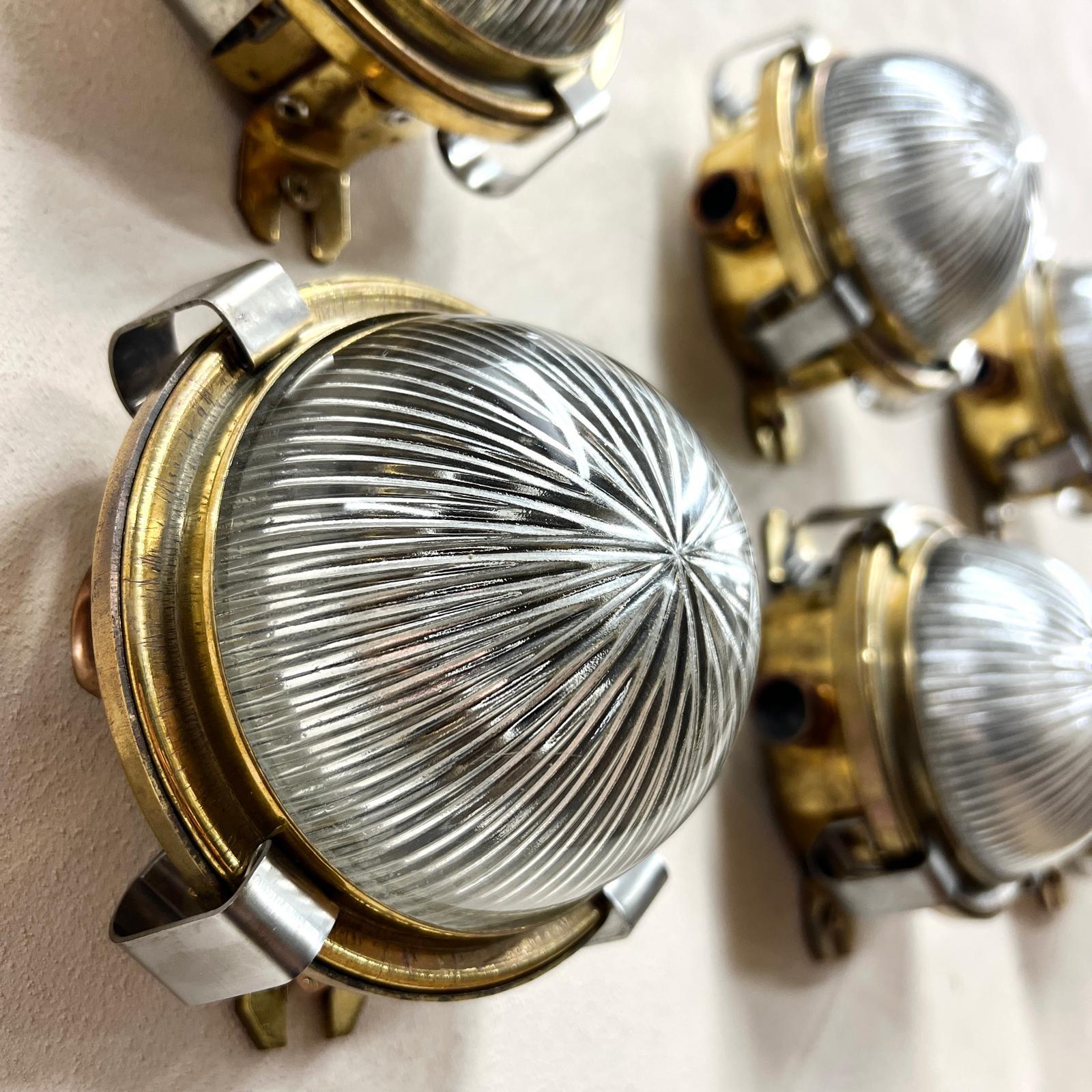 Circular Domed Holophane and Pressed Brass Wall lights 4