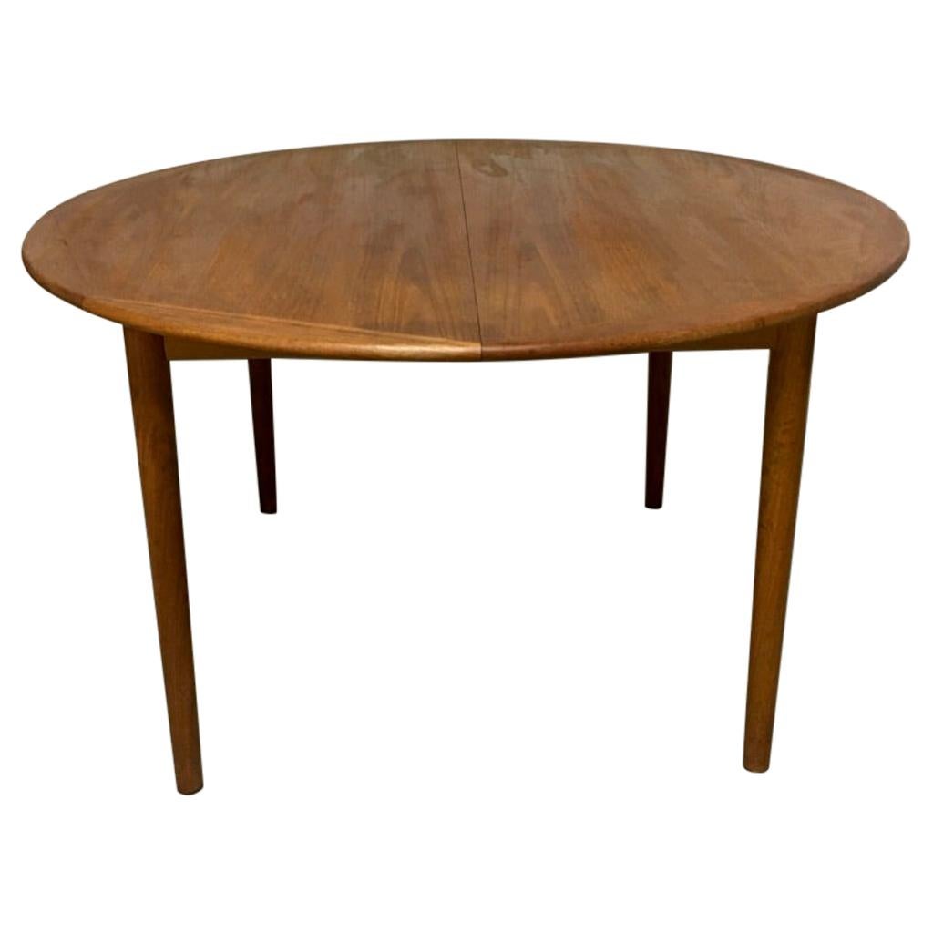 Circular Extendable Danish Teak Dining Table, circa 1960