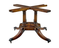Circular extending jupe dining table with burr detailing