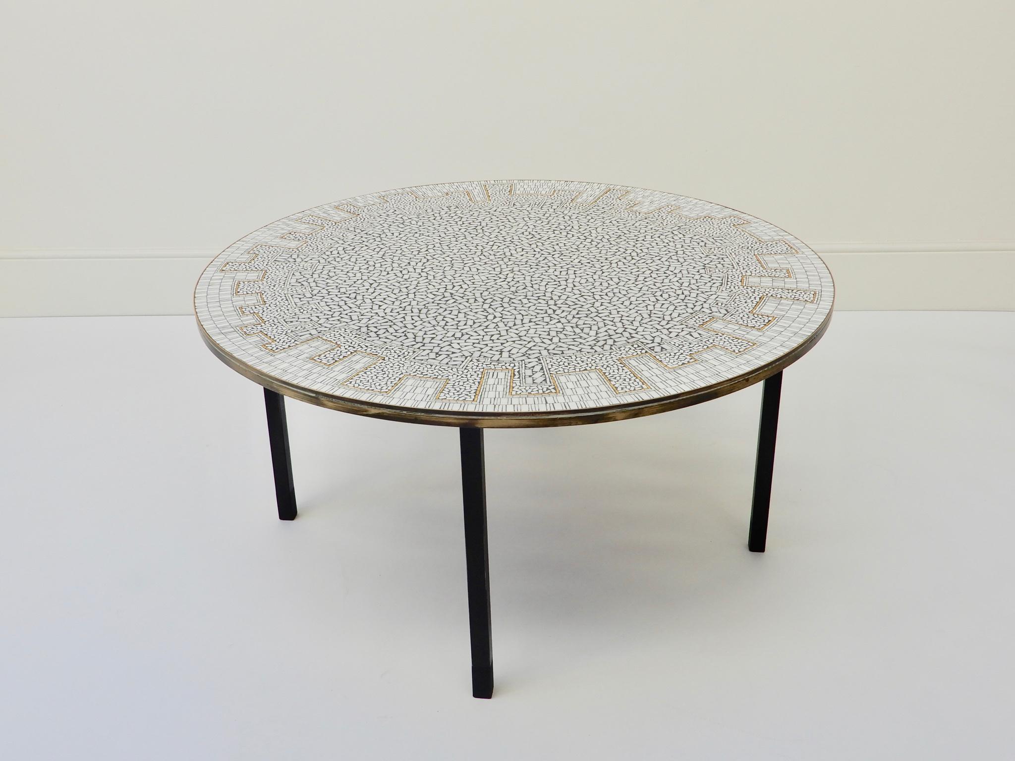 Circular German ceramic tiled coffee table with metal base, 1960s.
      