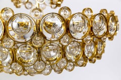Circular Gilt Brass and Optical Lens Crystal Multi Tier Chandelier by Palwa