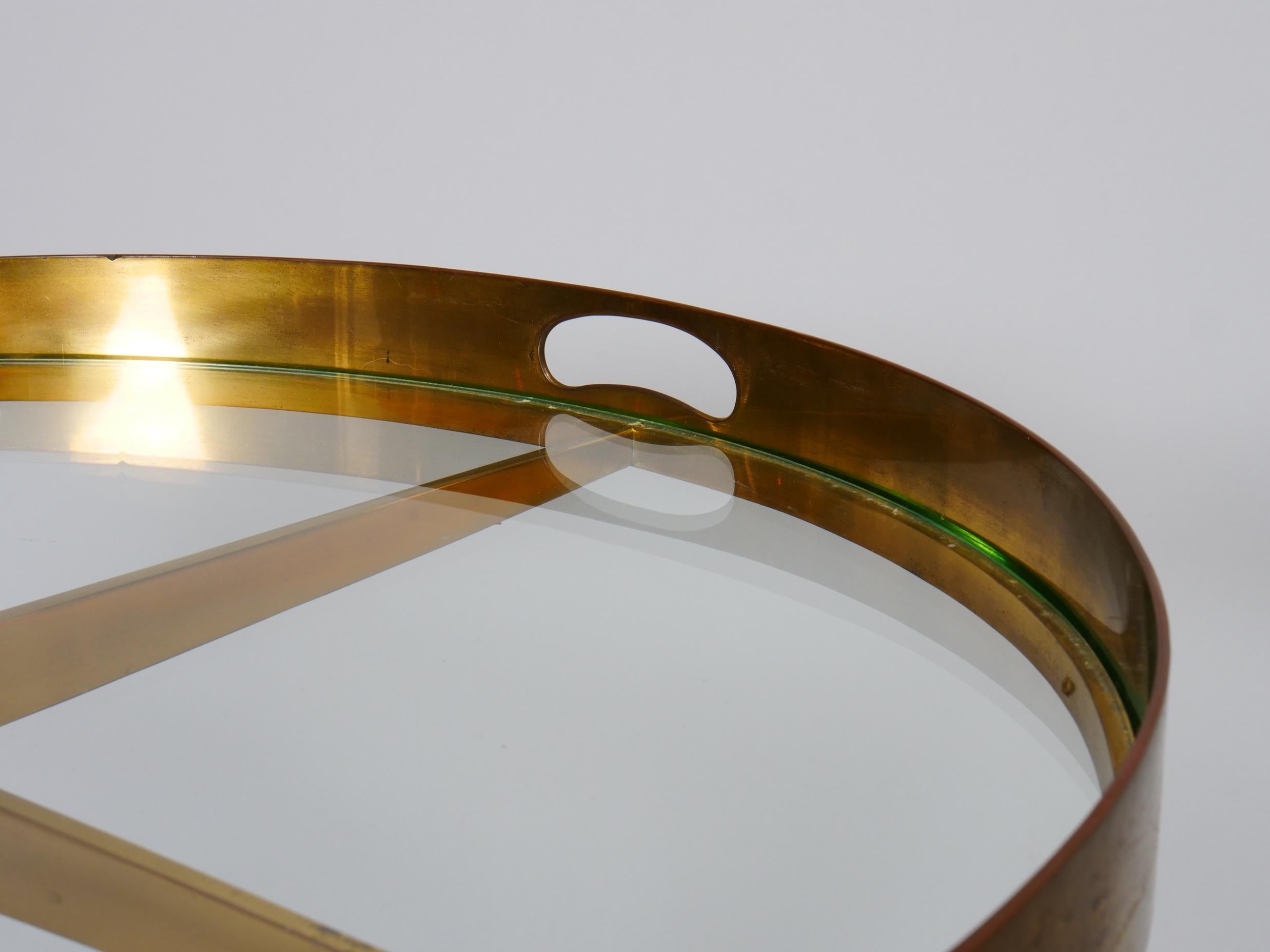 Circular Gio Ponti style brass and glass table. Italy c1950 For Sale 1
