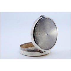 Circular guilloche silver pill box with hinged lid