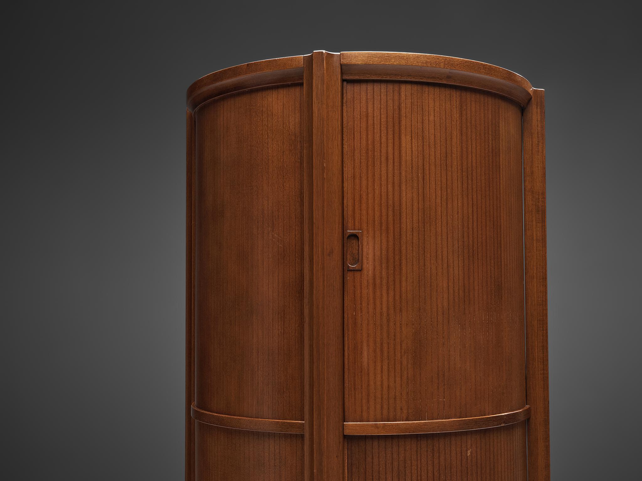 Circular cabinet, walnut, metal, Italy, 1950s

Free-standing cabinet or bookcase in circular shape. Three levels with shelves allow you to showcase your chosen belongings. Each level is equipped with sliding doors that can close up the cabinet.