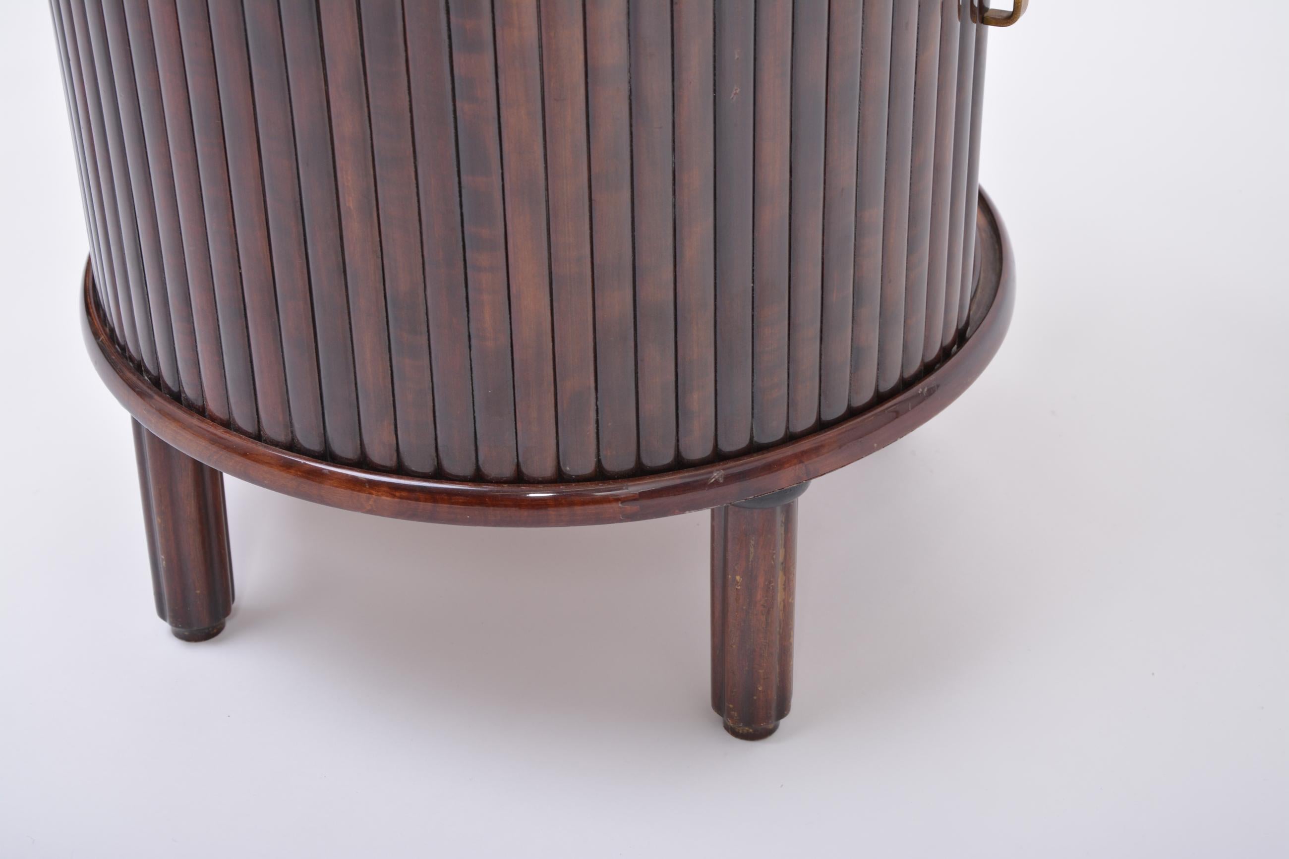 Circular Italian Mid-Century Bar Cabinet with Sliding Doors and Swiveling Tray 3