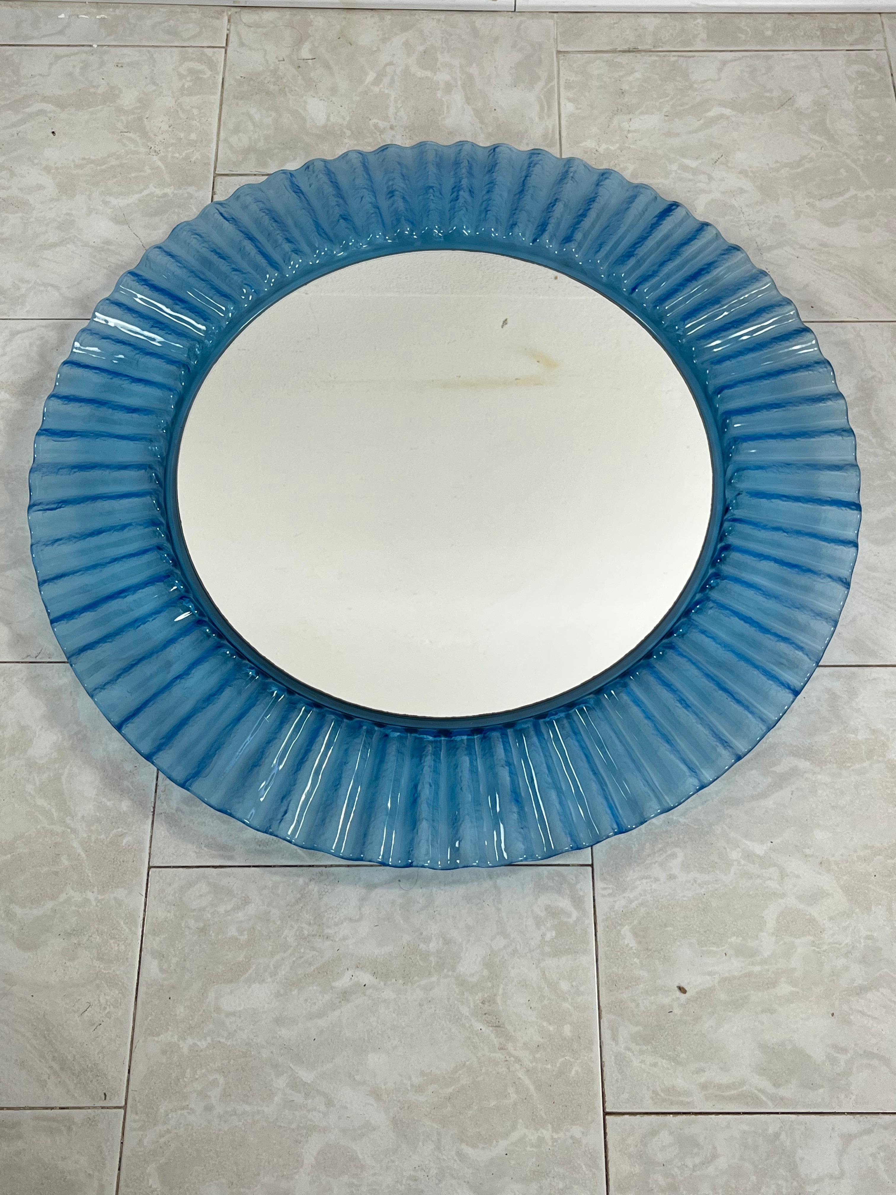 Circular light blue acrylic wall mirror 1970s, old warehouse stock.
Found in a closed shop and never used. Excellent condition.