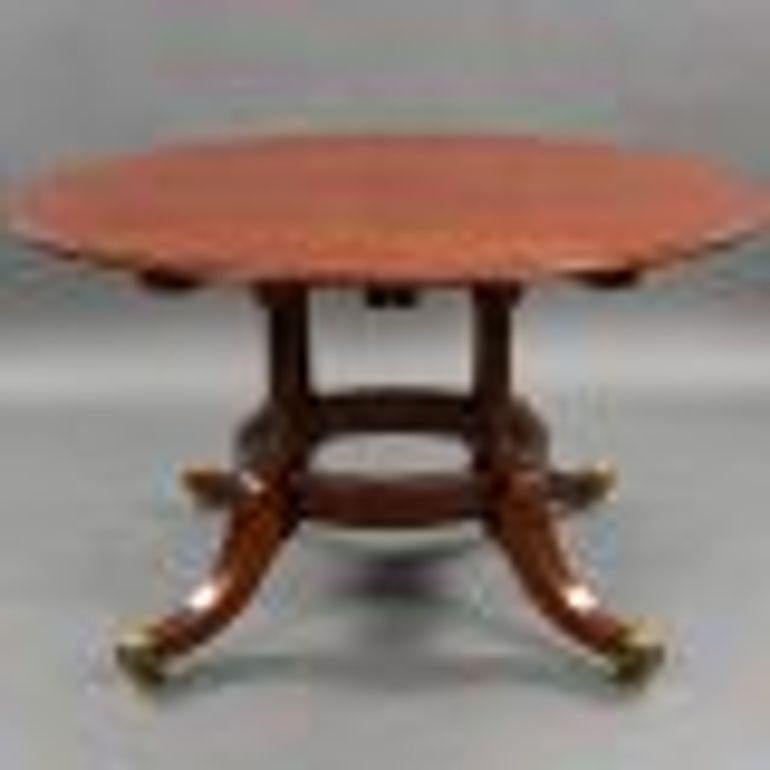 For sale is a good quality mahogany circular extending dining table with 5 additional leaves. The table is in very good condition, showing minor signs of wear commensurate with age and use.
Width: 130cm Depth: 130cm Height: 73cm
Width (extended):