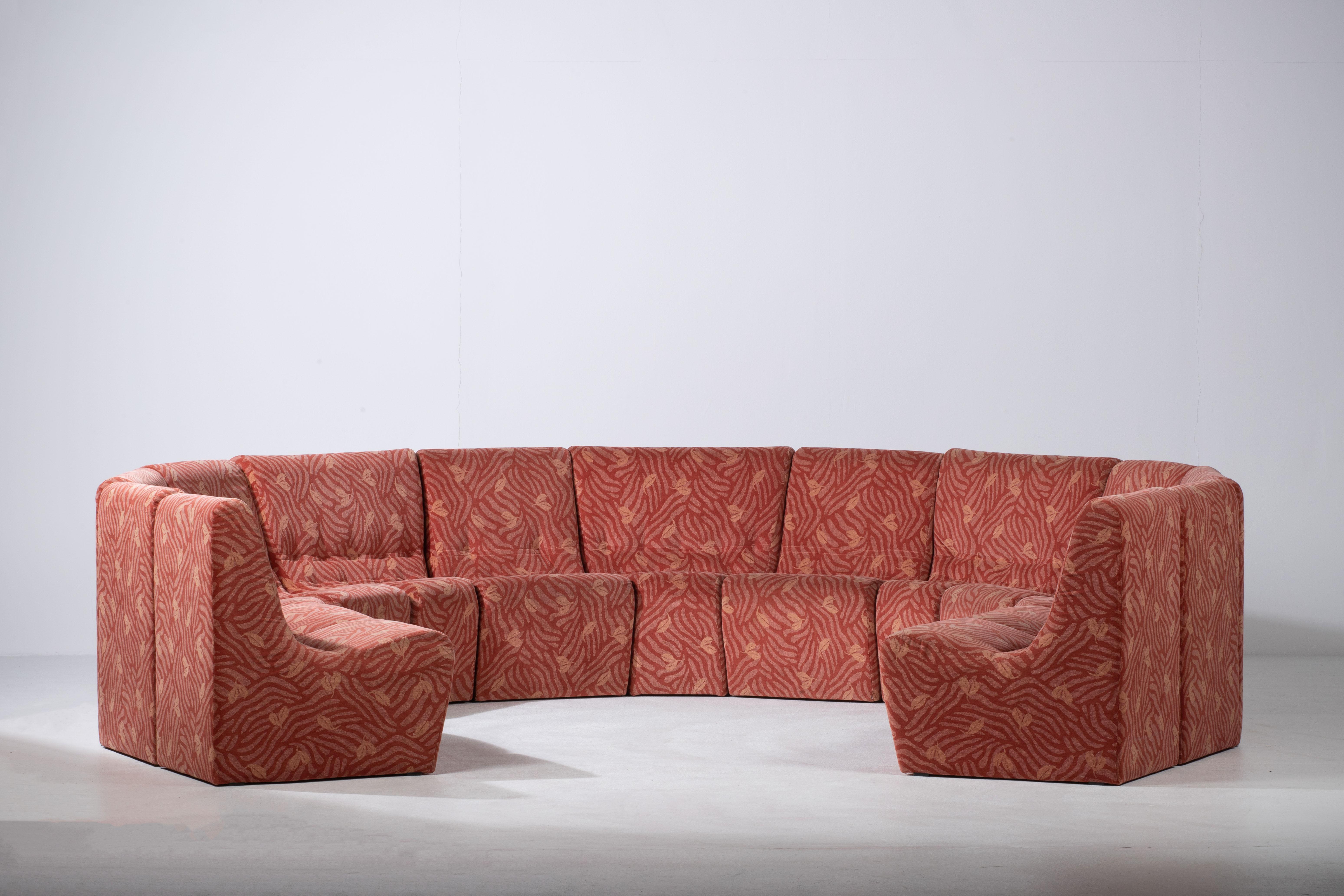 Mid-century modular sofa in a beautiful pink fabric.
Consist of 13 modules of 318 centimeters long when all assembled.
Scandinavian Modular Sofa.
Period: 60s
Materials: Fabric

Good vintage condition with minor wear.
 