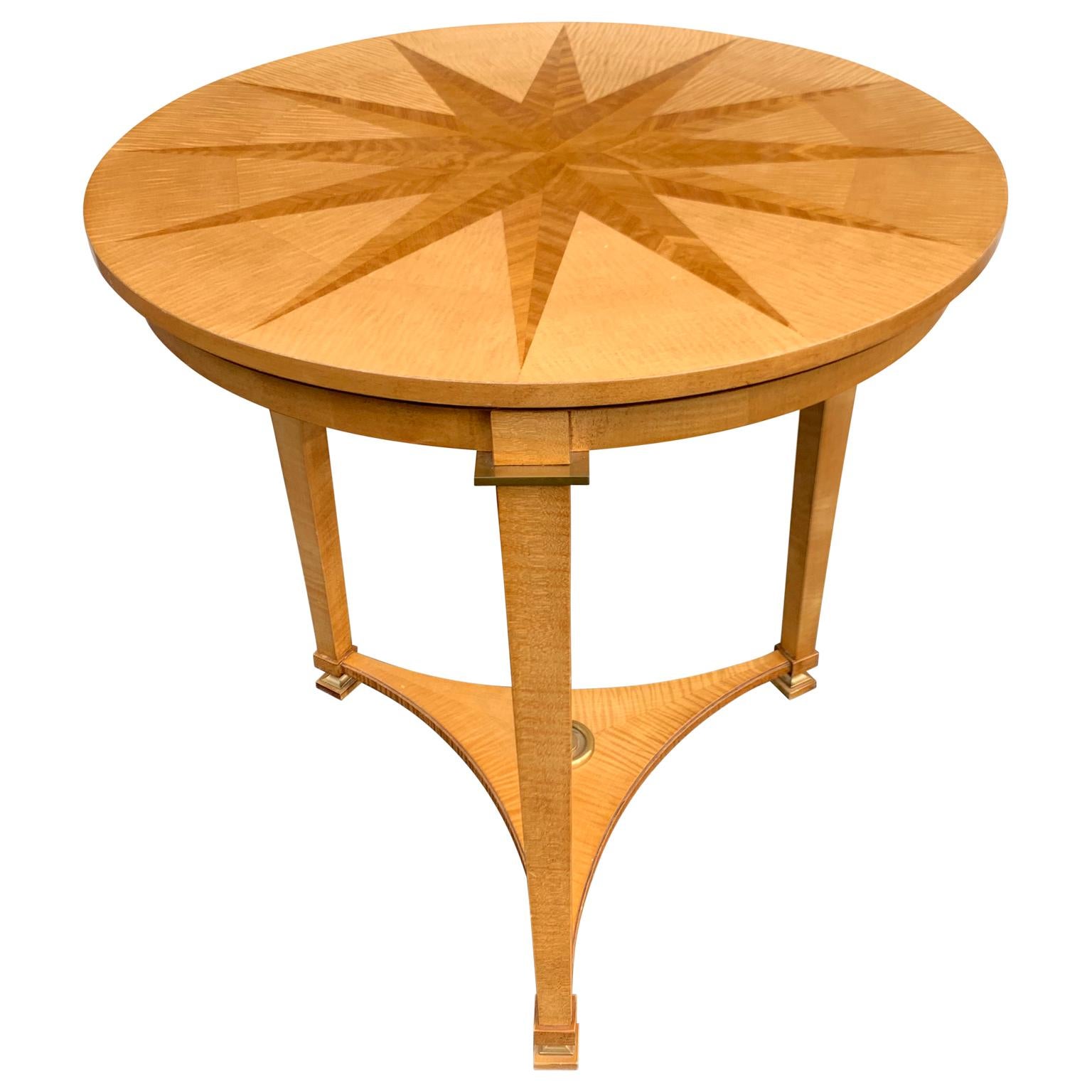 Circular Mid-Century Modern maple sunburst inlaid Gueridon table, by the André Arbus collection for baker.

   