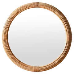 Circular mirror in rattan and wicker by Vivai Del Sud, 1970.