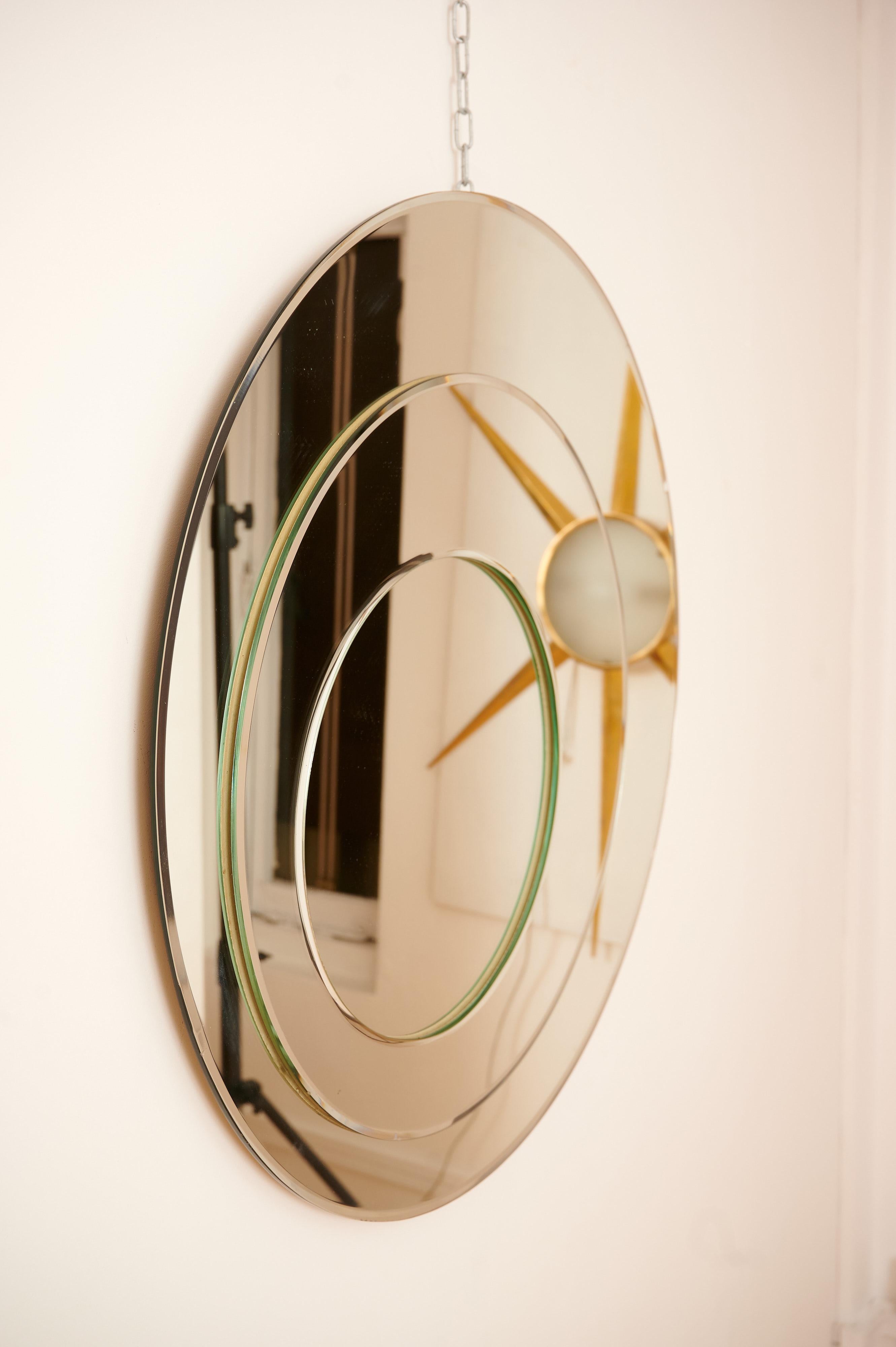 Decorative circular mirror from 1970s Italy.

