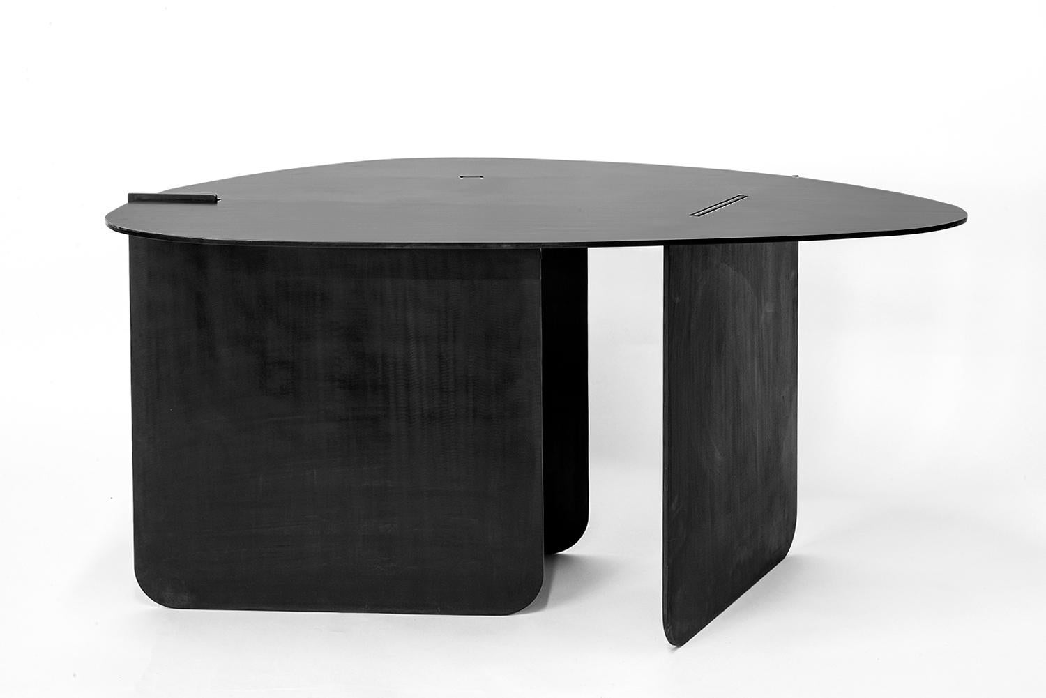 Table No. 15 - ALTO
J.M. Szymanski
d. 2022

This Noguchi-inspired coffee table is handcrafted in 3/8” thick steel, with a natural black patina and wax finish, to create an ulta-modern and inspired look. 

Custom sizes available. Made in the