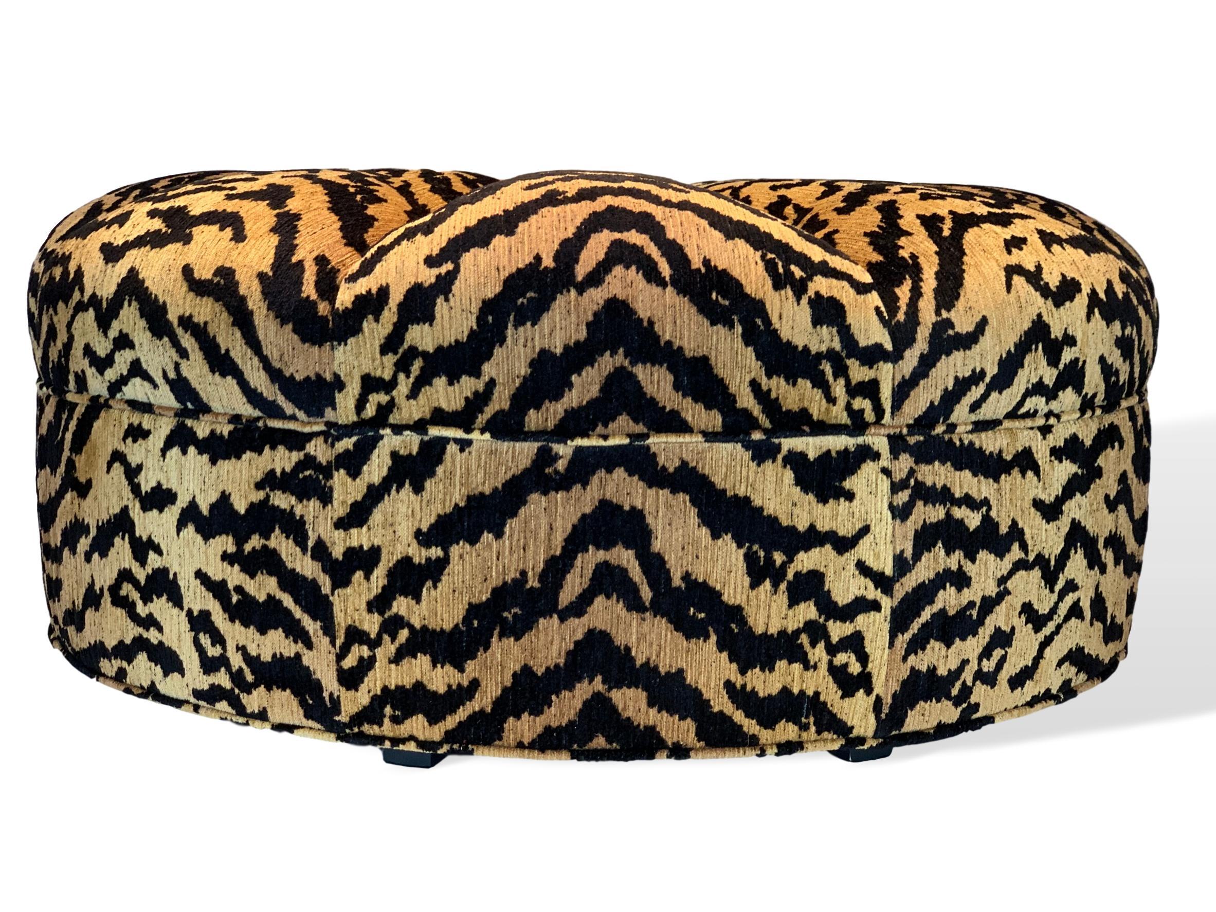 Large 41-inch circular ottoman in Italian designer ultra high-end silky tiger skin woven heavy cut and uncut chenille; the hand of the fabric is unexpectedly soft and luxurious. Ottoman was recently handcrafted and upholstered from new materials and