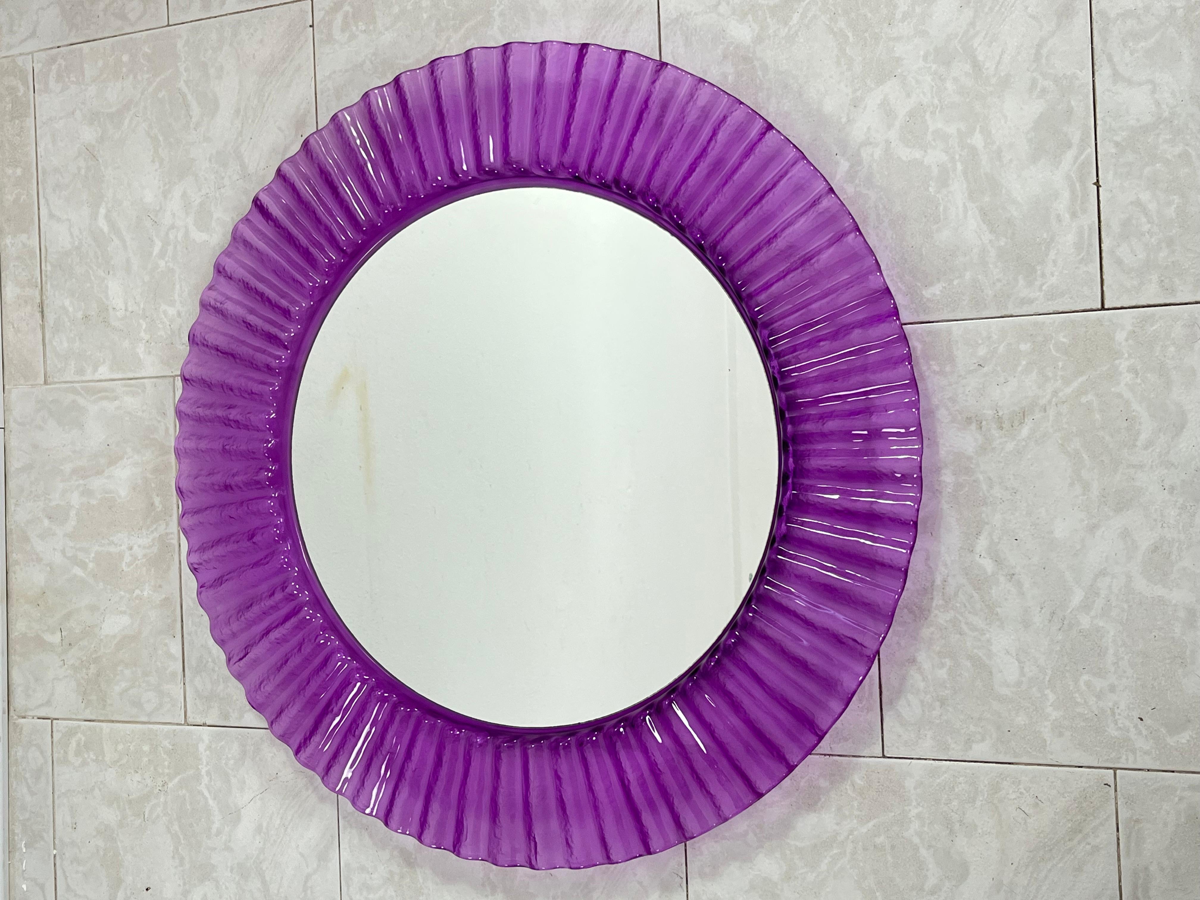 Circular purple acrylic wall mirror 1970s, old warehouse stock.
Found in a closed shop and never used. Excellent condition.