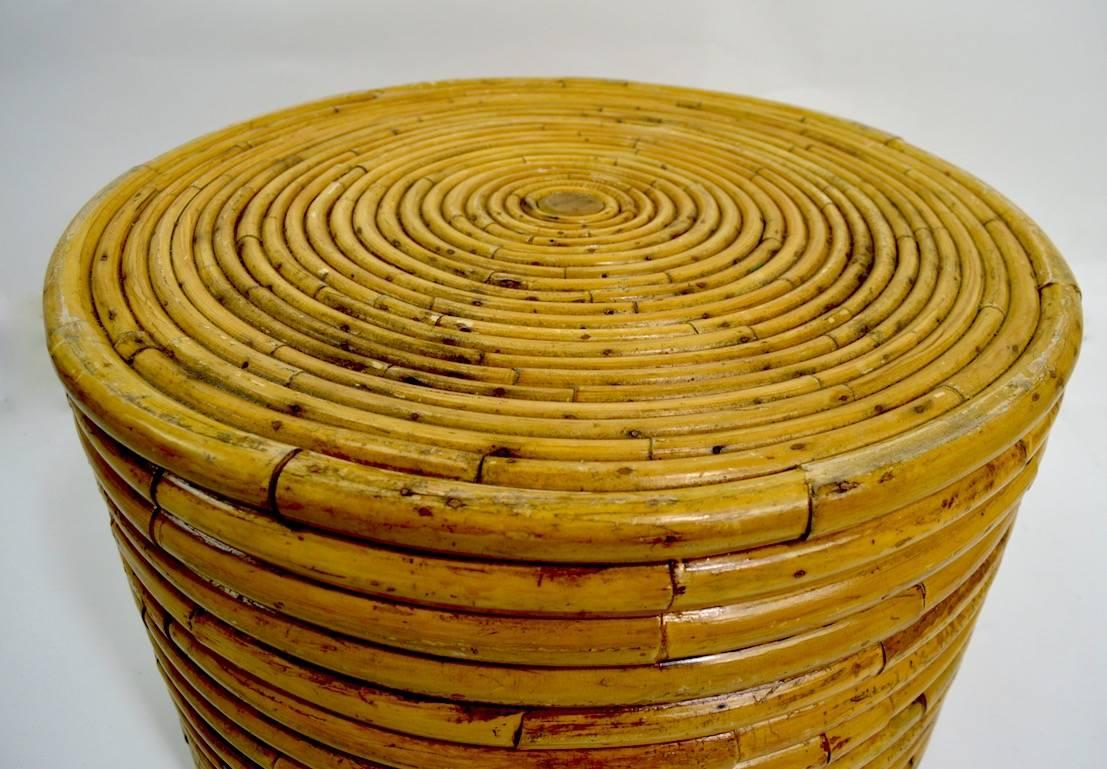 Stylish round bamboo stand, circa 1930s Art Deco period. This example shows some cosmetic wear to finish, normal and consistent with age, it still retains the original paper tag which reads Asia Rattan Philippines '36. Hard to find pre war examples