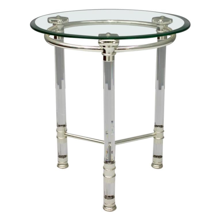 Circular side table in glass, acryl and slivered metal, France 1980s.

Very good condition.