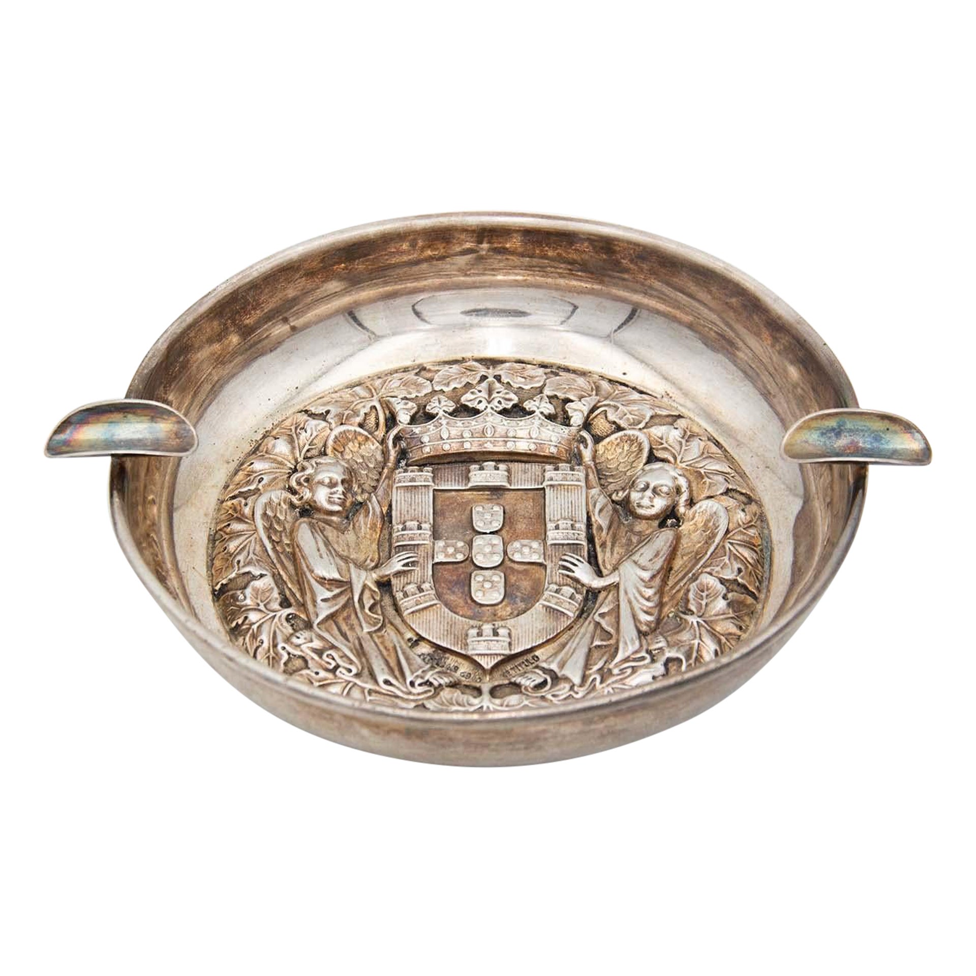 Circular silver ashtray with two cigarette holders