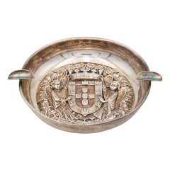 Circular silver ashtray with two cigarette holders