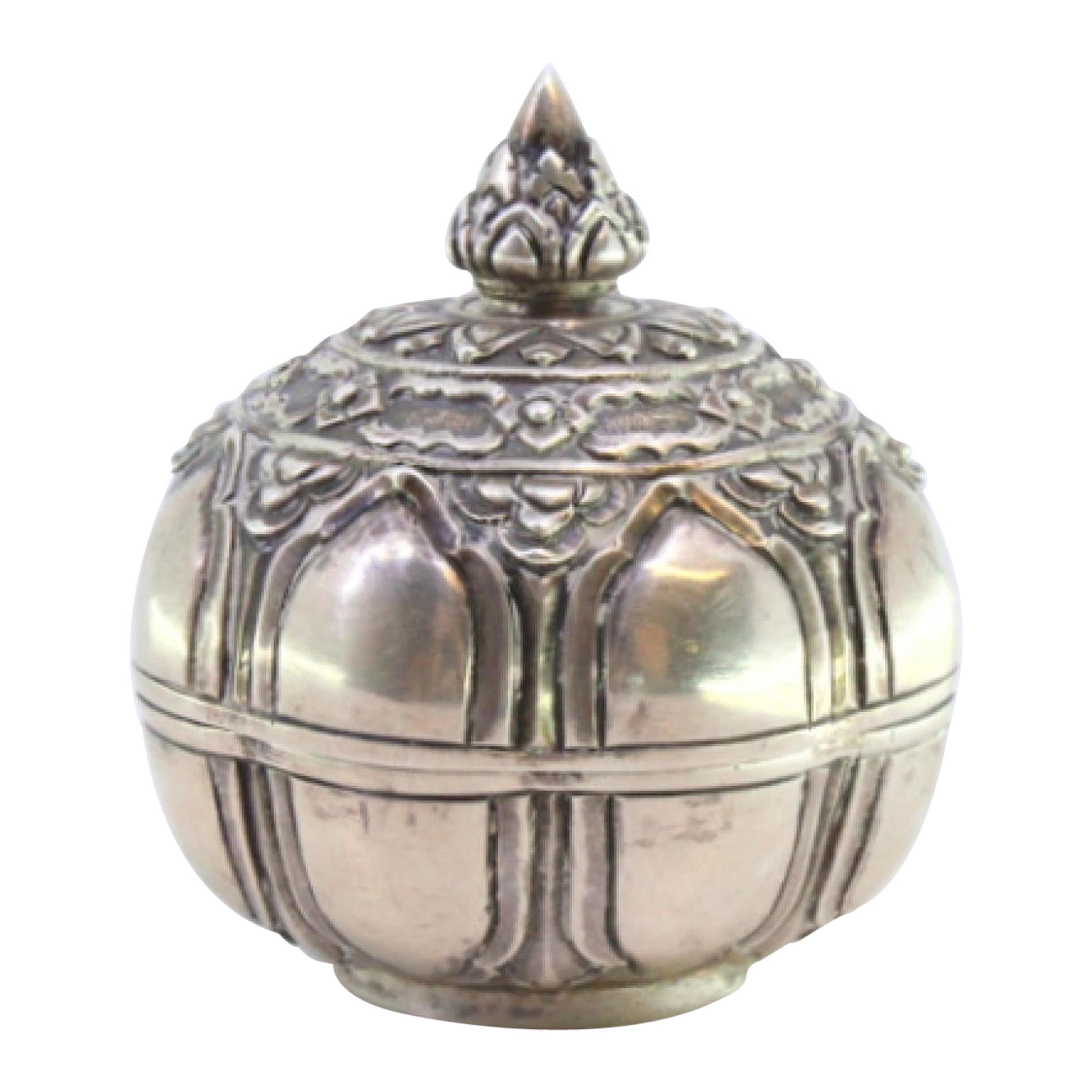 Circular silver box with embossed fruit and knob on the lid