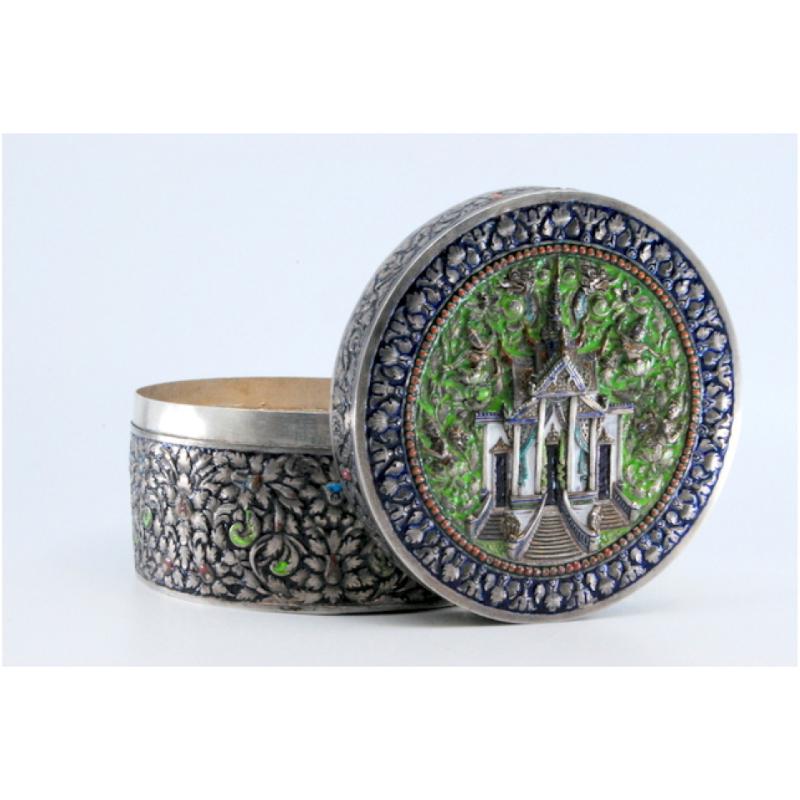 20th Century Circular silver box with enameled reliefs in oriental style and Buddhist temple For Sale