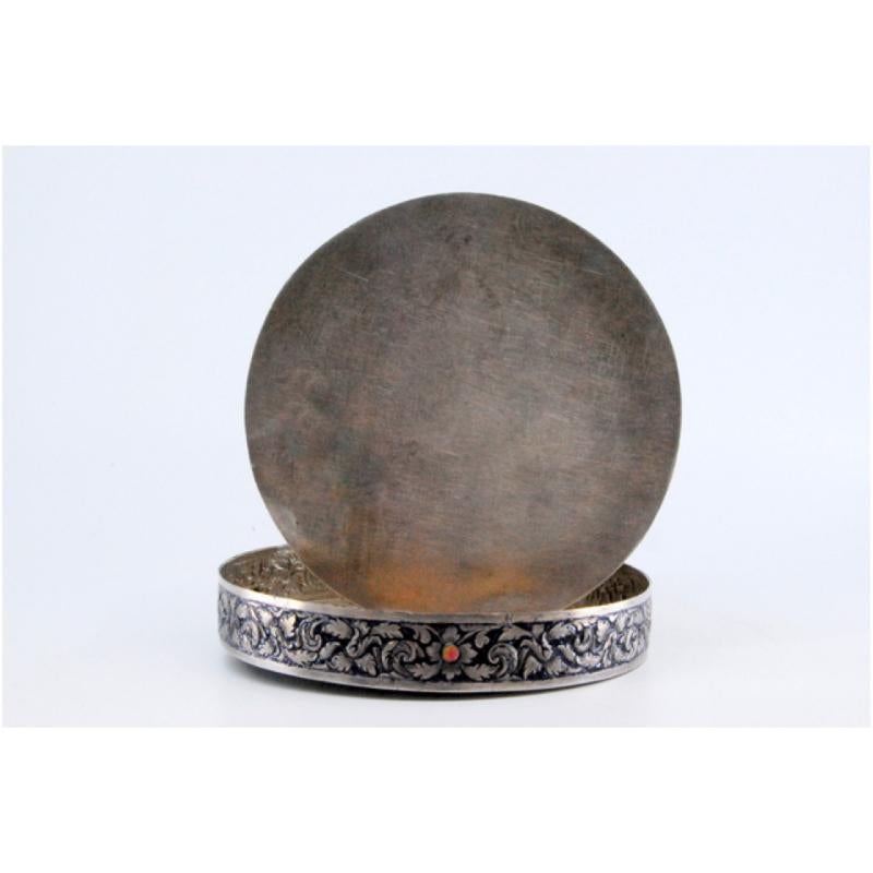 Silver Circular silver box with enameled reliefs in oriental style and Buddhist temple For Sale