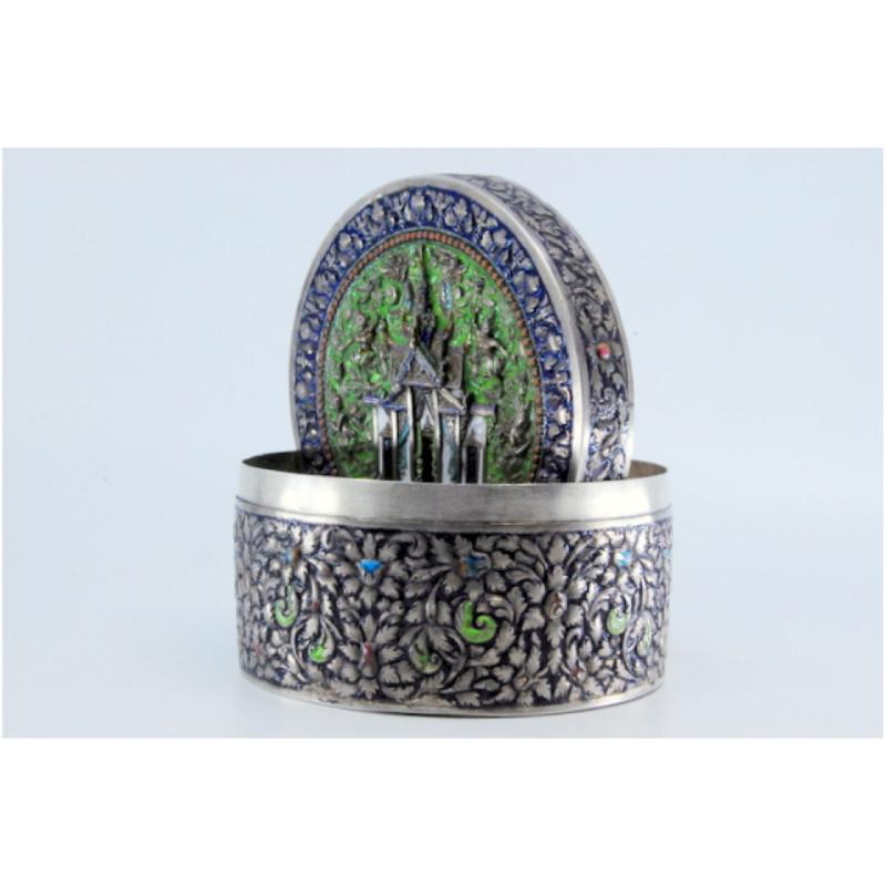 Circular silver box with enameled reliefs in oriental style and Buddhist temple For Sale 2