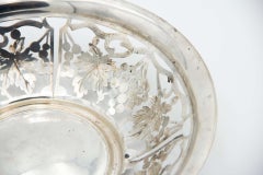 Circular silver fruit bowl