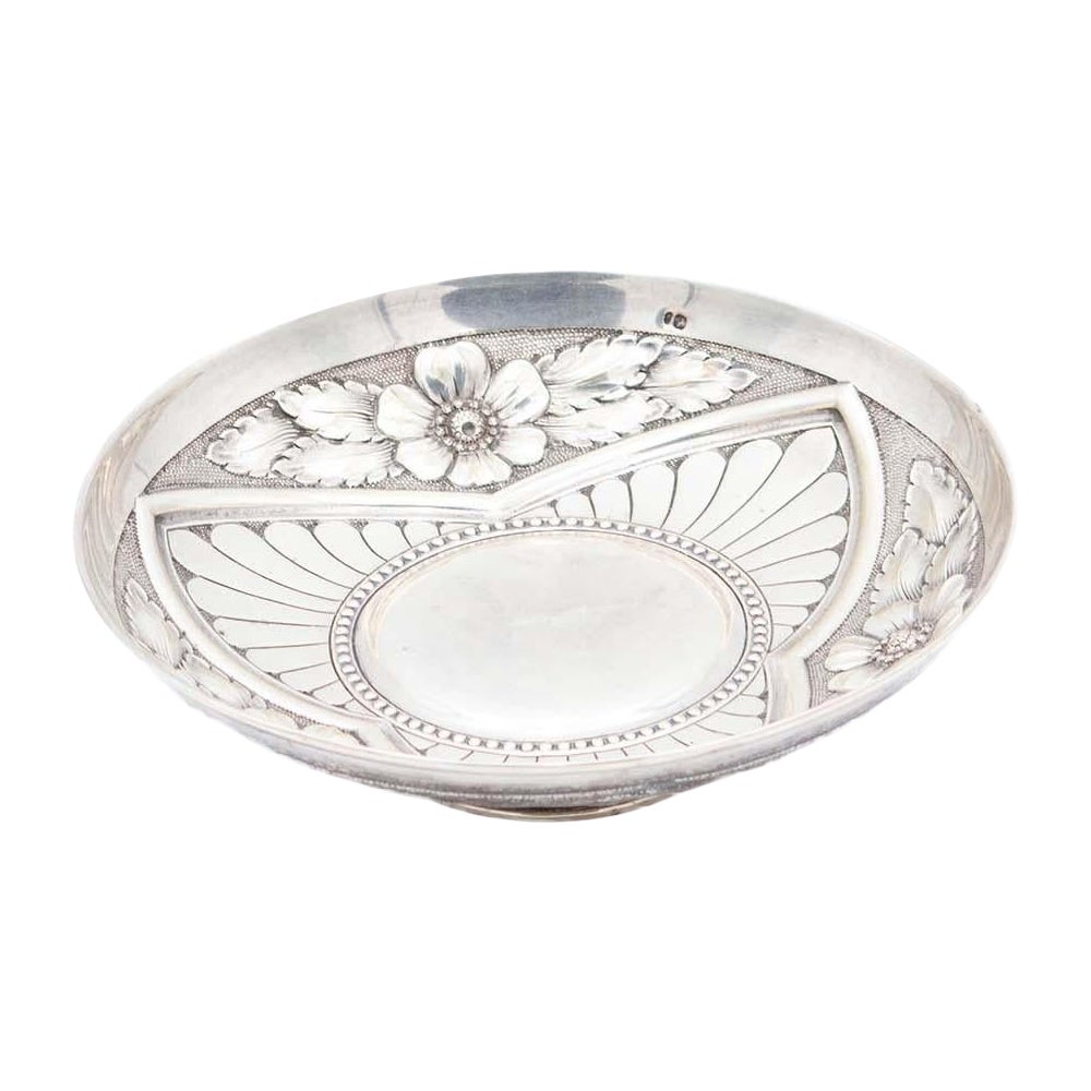 Circular silver fruit bowl