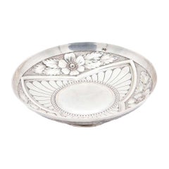 Circular silver fruit bowl