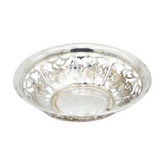 Circular silver fruit bowl