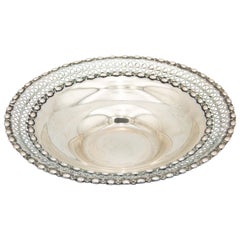 Circular silver fruit bowl